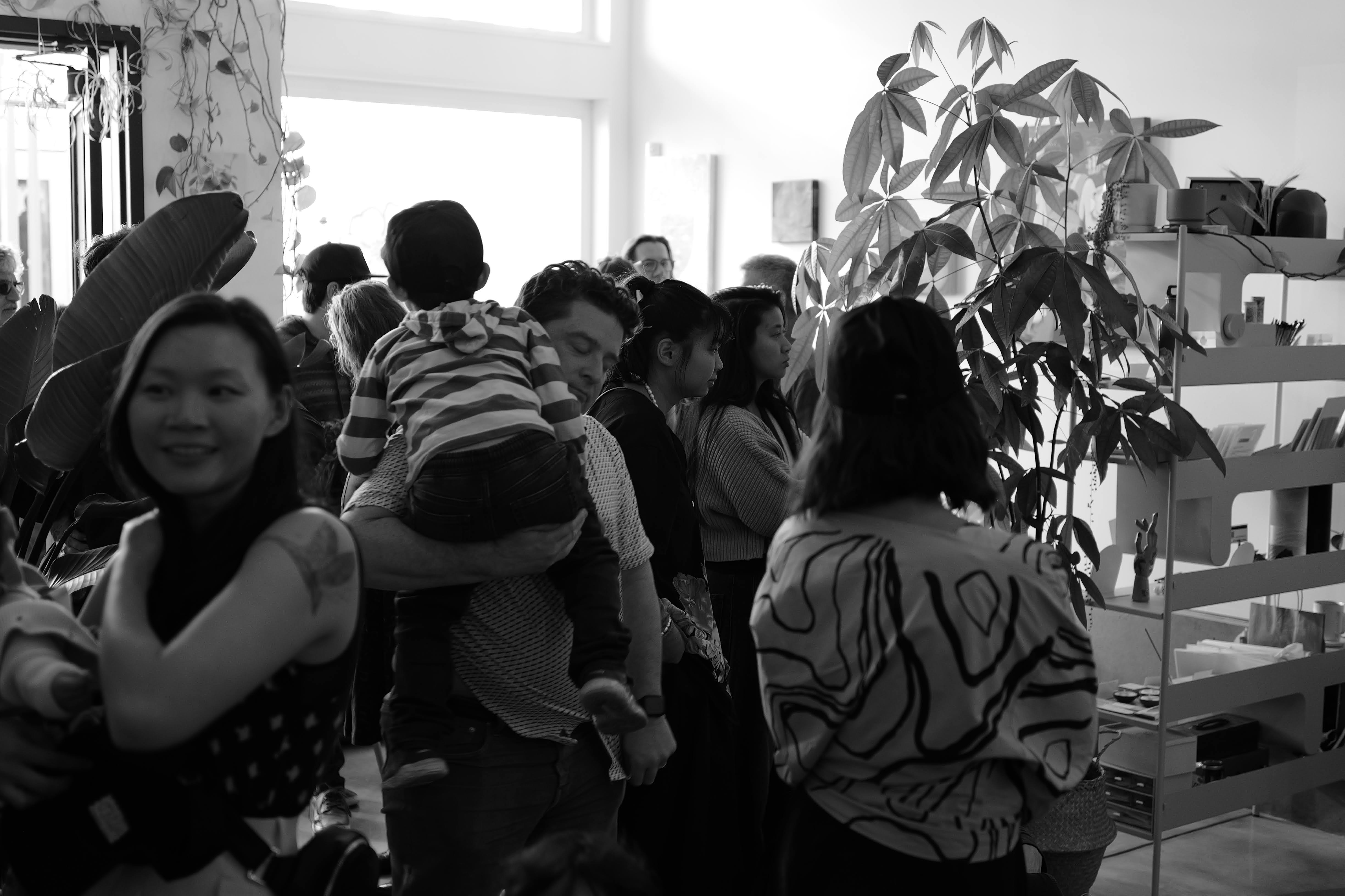 The gallery full of people during the chapter 01 opening.