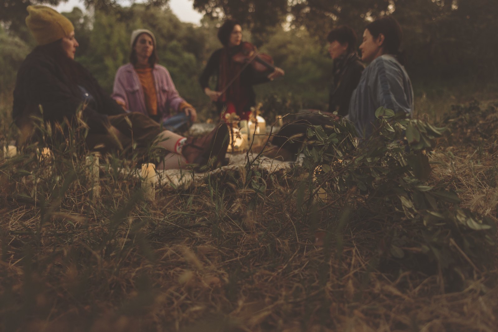 The circle gathers at dusk